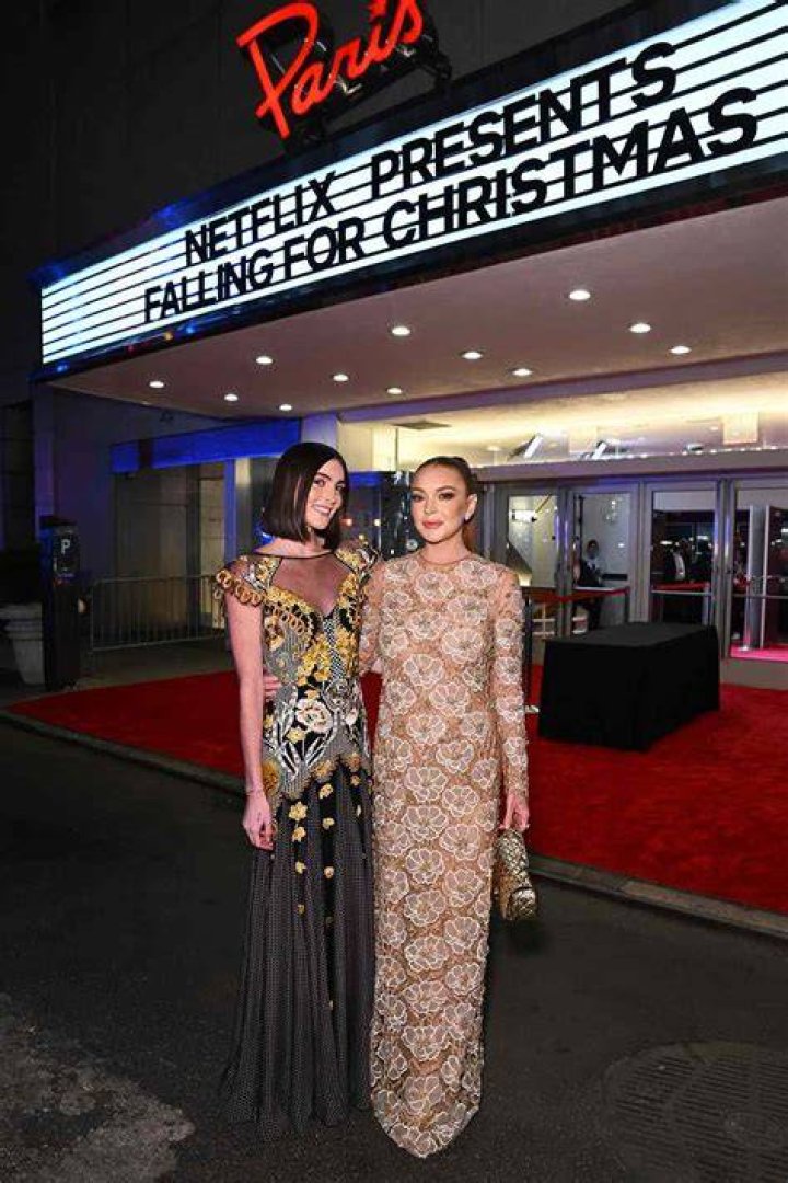 
Lindsay Lohan and Sister Aliana Lohan Hold Hands on the Way to ‘Falling for Christmas’ Premiere 