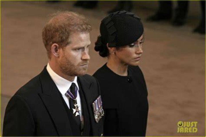 
Prince Harry, Meghan Markle Hold Hands During Queen Elizabeth’s Emotional Funeral 