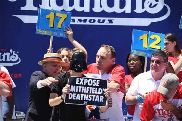 What Is “Expose Smithfield Death Star” About? Protestor Tackled By Joey Chestnut